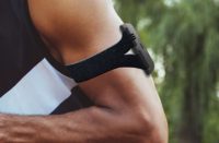 Arm band on a muscular mans arm