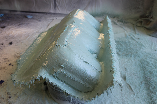 AroStruct is Similar to Fiberglass - Spraying of the polyurea basecoat and topcoat is achieved with a plural component spray gun connected to a long heated hose and pump machine. 