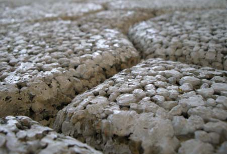 Pervious concrete can be pattern-stamped using metal stamping tools.