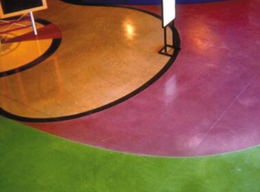Solid magenta and green colors come alive with concrete stains on classroom floors