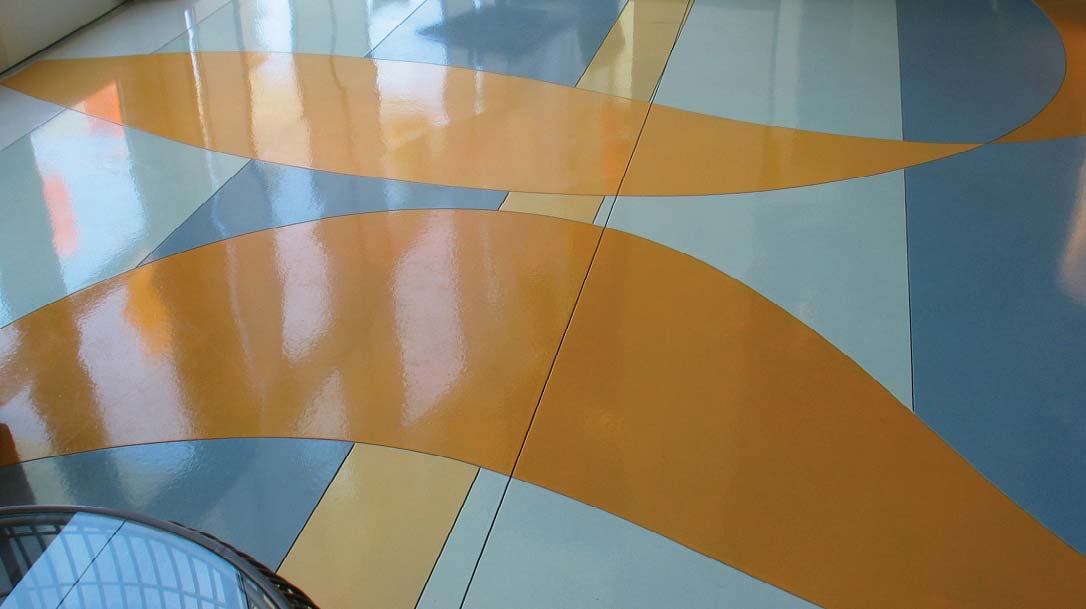 Ardex Engineered Cements SD-T self-drying, self-leveling concrete topping, saw-cut and stained at the Renaissance ClubSport in Aliso Viejo, Calif. Photo courtesy of Ardex Engineered Cements