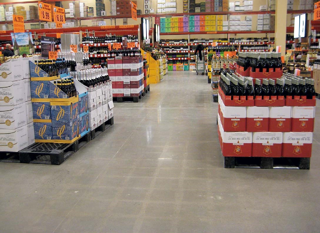 At one time this floor had vinyl composition tile (VCT) on it. When the tile was removed, ghost marks remained. The marks are visible even after polishing.
