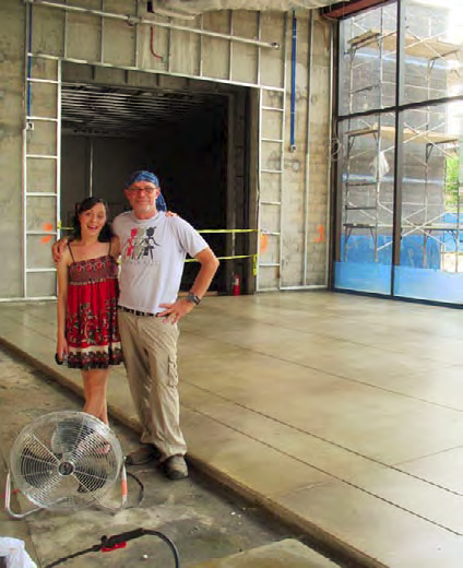 Mike Miller, concretist, and his daughter, field biologist Karley Miller, preen in front of the finished (not so much as a single crack
thats not like him!) Daffodil Terrace slab.