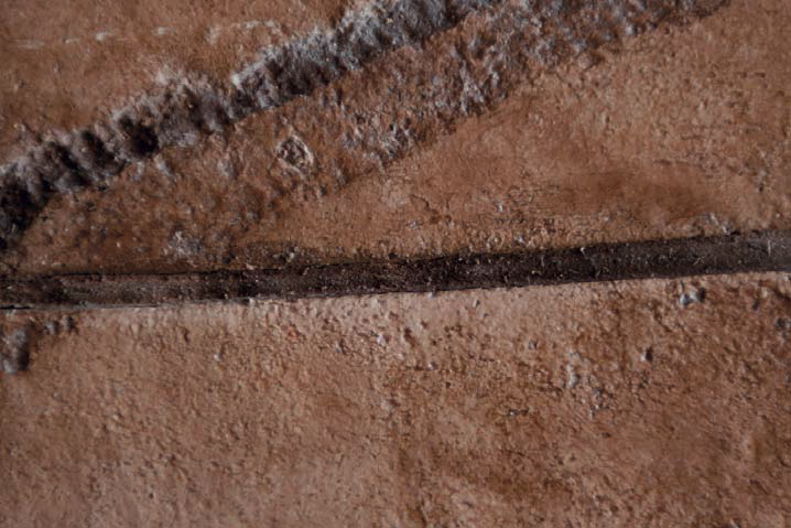 A close-up of a semirigid joint filler in a contraction joint. The work was done by Carlton Concrete Inc.