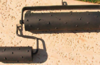 Hand rollers for concrete to make the appearance of a rock salt finish.