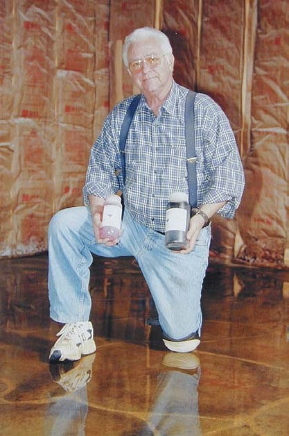 This liter and half-liter bottle of concentrate will make up to 15 gallons of stain.