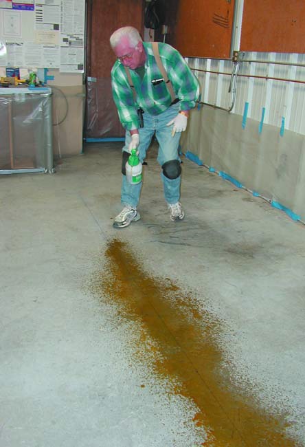Staining concrete can be made easier with a simple garden sprayer.