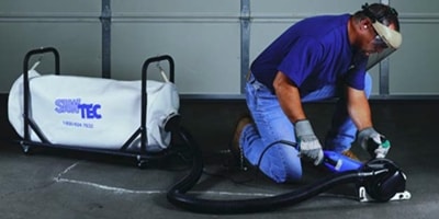 A SawTec saw and vacuum are being used on the job here to create less mess after the saw cuts are made.