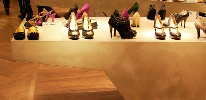 The display tables were created in New Jersey, shipped to London and assembled. They are approximately 20 feet long, 3 feet high and range in width from 40 inches to 8 feet.
