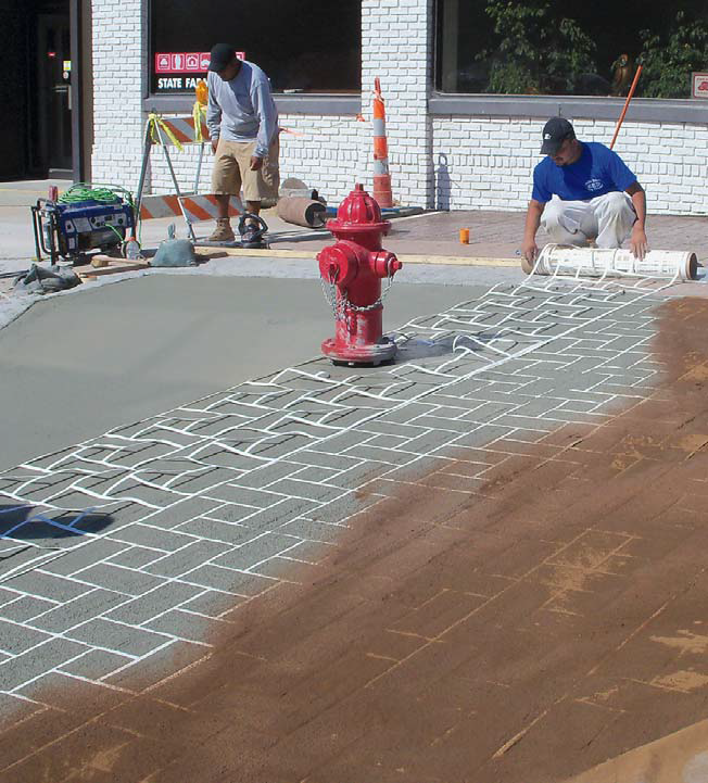 Stenciled concrete is conducive to many textures, whether smooth to seamless textured skins, a broom finish, or a texture roller. Gone are the days of getting 12 to 15 stamps at $150 per stamp and nailing just the right timing to produce a constant texture through the pour.