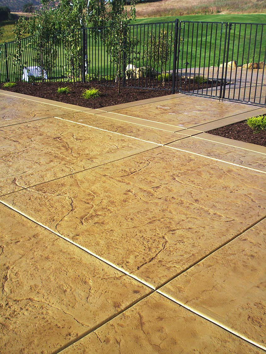 Glen Roman of Staintec successfully matched a total of 20,000 square-feet of both new and old concrete with the use of NewLooks Solid Color Stain System.