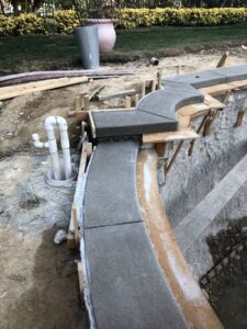 concrete surface color problems on pool coping