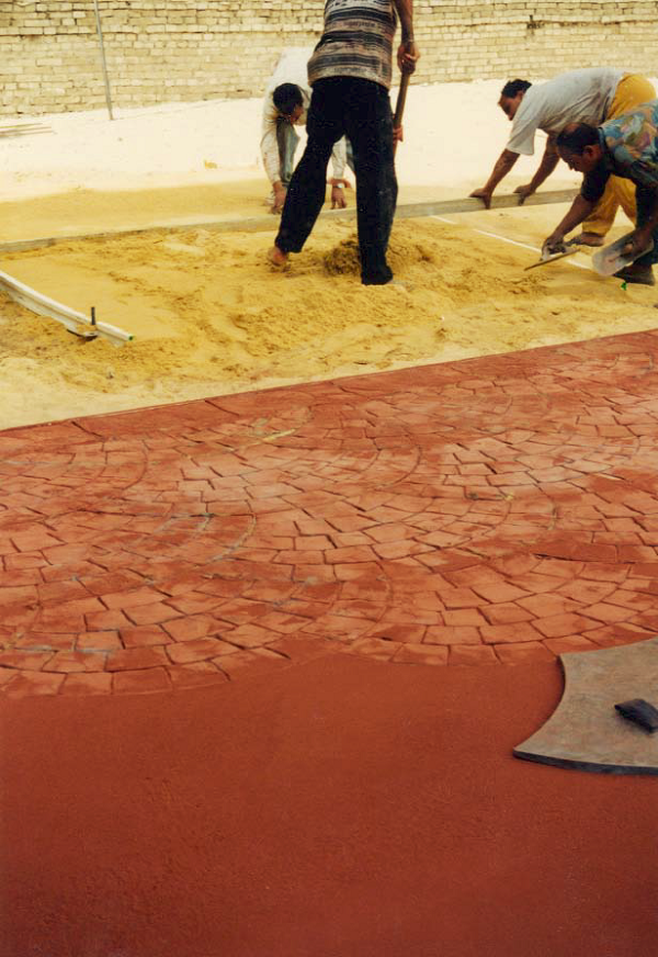 To train workers in Egypt, fine sand was utilized to practice screeding, floating, finishing, and stamping concrete
