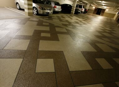 Dark and light areas of this concrete overlay give a geometric look to the space.
