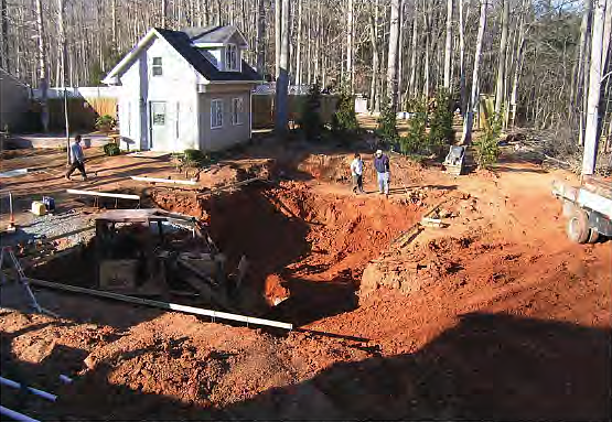 Crews had to cautiously work around more than one mile of plumbing and electric. Crews had to cautiously work around more than one mile of plumbing and electric while placing and then stamping concrete around the swimming pool.