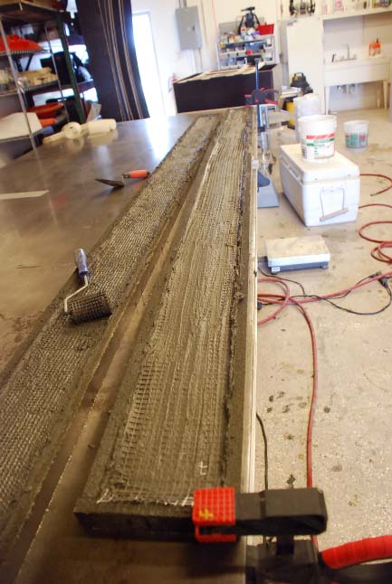 Scrim is placed in an 11-foot-long concrete countertop back splash.