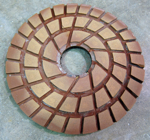 Cupping caused uneven wear on this thick pad.