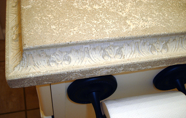 Victorian detailed bathroom concrete countertop. This floral edge is easy (and profitable) to do with concrete, but nearly impossible to get with granite.