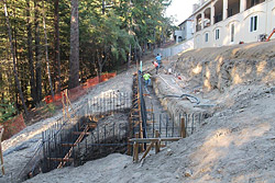 he structural engineer handled calculations and specifications for footing and wall thickness, rebar schedules and so on. The civil engineer took on the drainage plans. We have done this on other occasions, Ralston says. I love to handle the communication interface because good coordination in a complicated project is key to a successful project.