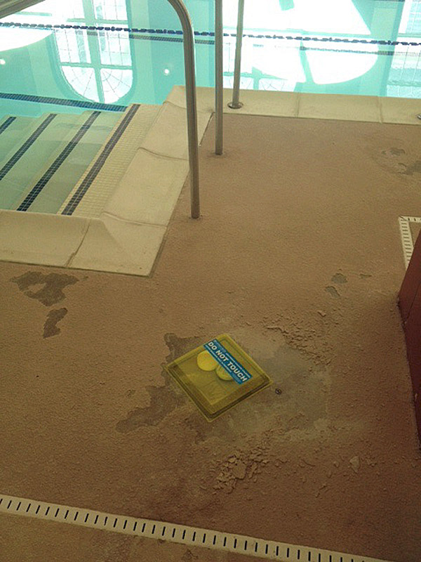 Failing acrylic sealer on stamped concrete