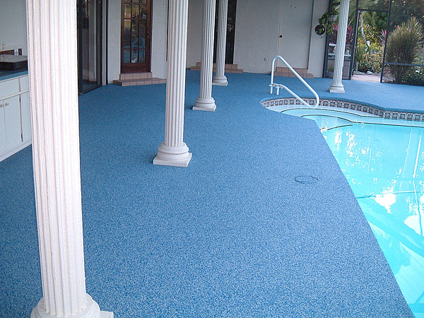 Florida homeowners opted to resurface a patched and repaired concrete pool deck with TPV rubber. Photo courtesy of American Recycling Center Inc.