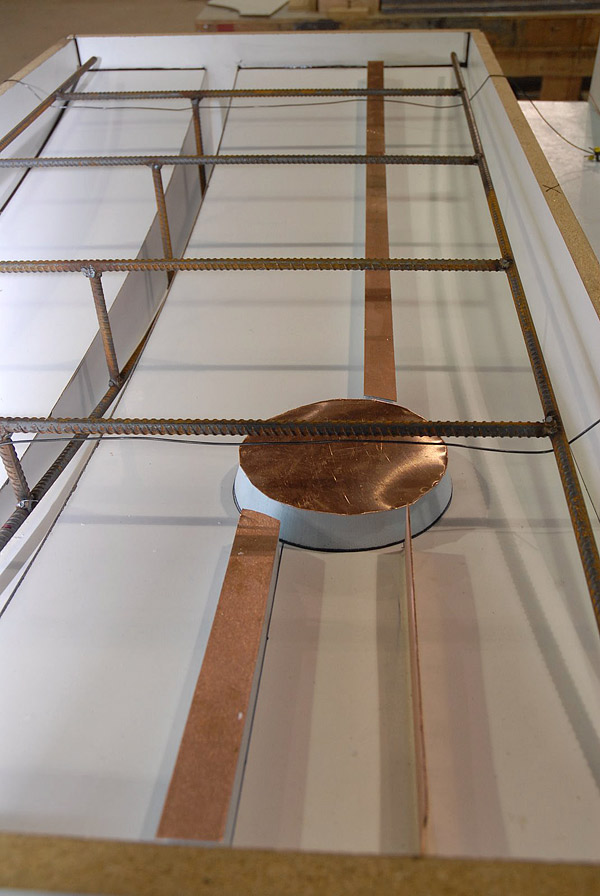 This fireplace mold surface is laminate. The recess is rigid foam board and copper. Photos courtesy of Laurel E. Scherer