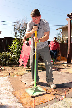 Stamping a concrete walkway