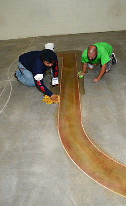 Engraving concrete and stenciling concrete