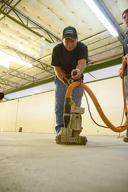 Engraving designs into concrete