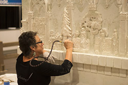 cast and carved concrete fireplace