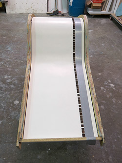 Glass fiber reinforced concrete (GFRC) is now a very popular method for creating concrete countertops, fireplaces and more. Typically, the visible surface of GFRC is created by spraying a fluid, fine, sand-based mix into the molds to create a thin layer.