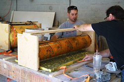 After the GFRC has been placed into the lattice concrete mold it is bent onto a device that will hold it in a semi-circular shape.