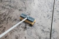 a brush on concrete sealing it