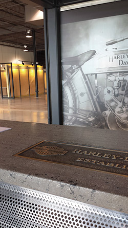 Putting a nameplate in a concrete countertop