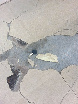 Overlays are only as good as the surface they go over. Surface contamination and poor surface preparation caused this overlay to fail. Photo courtesy of Chris Sullivan