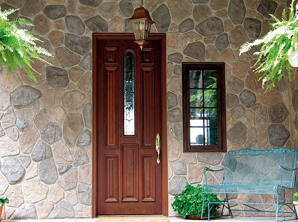 carved concrete Stone That Looks Like Fieldstone - Is it real or concrete? The fieldstone look-alike is provided by single-stone stamping and one of Flex-C-Ments products for exterior decor. Photo courtesy of Flex-C-Ment