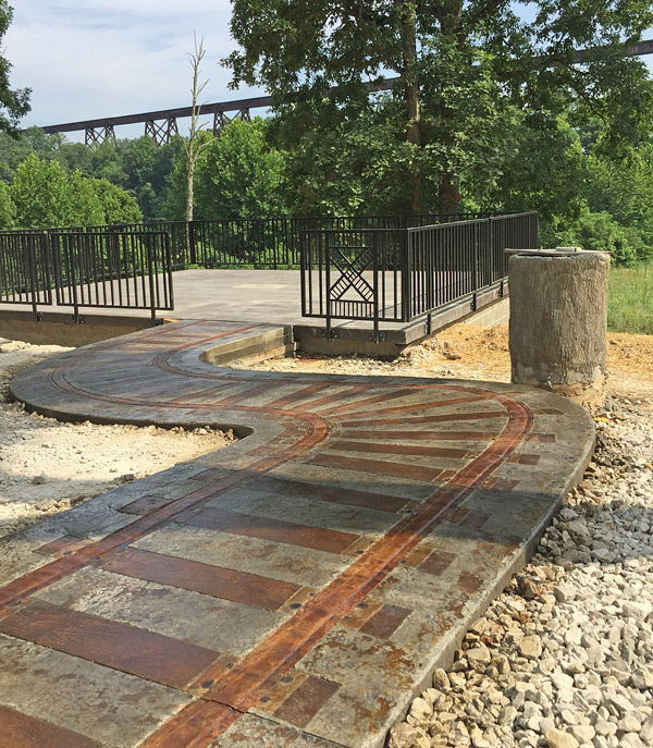 concrete walkway that looks like railroad tracks