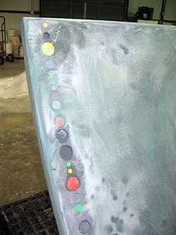 After de-molding, some of the stickers are pulled out.