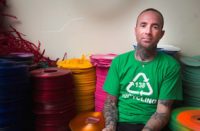 Troy Oliver in front of his records