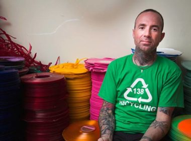 Troy Oliver in front of his records