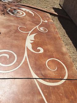 brown washed out floor with vine details