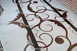 red and grey intertwined vines on grey concrete floor