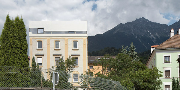 precast concrete extension on top of building