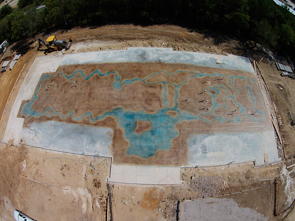 colored river runs through concrete floor