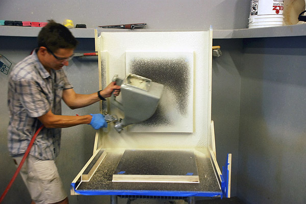 Casting a GFRC patio table spraying the GFRC through a hopper gun gets everywhere.