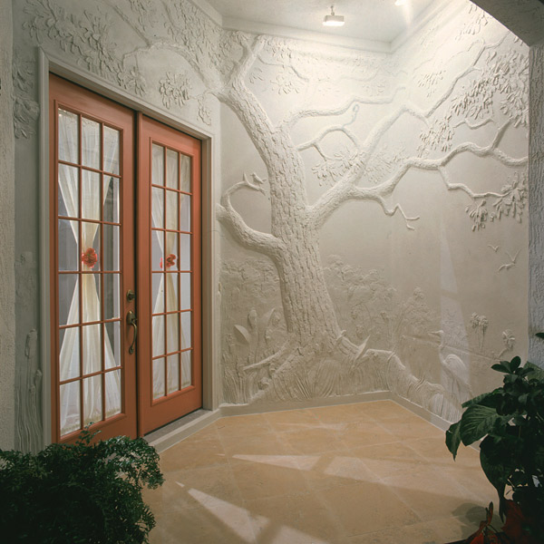 This sculptor from North Carolina imitates classical Greco-Roman walls which portrayed figures and events in low-relief carved marble. He starts flat and builds up his relief, using Sakretes High-Strength Mortar/Stucco Mix. He adds layer upon layer without it cracking.