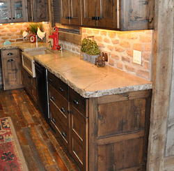 Kitchen sink and concrete countertop by Ben Ashby.
