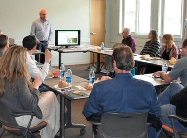 Group of architects listening to a presentation about decorative concrete