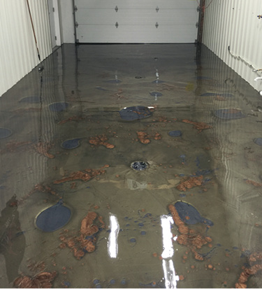 A base coat of Elite Cretes E100-PT1 Crystal Clear Epoxy mixed with three colors of Reflector Enhancer is applied.