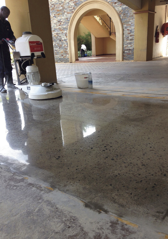 concrete polishing machine on burnished floor